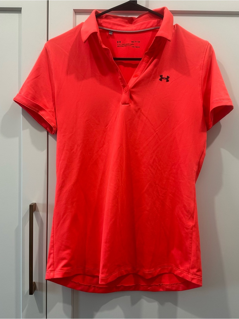 Under Armour Women’s Short Sleeve Polo in Coral